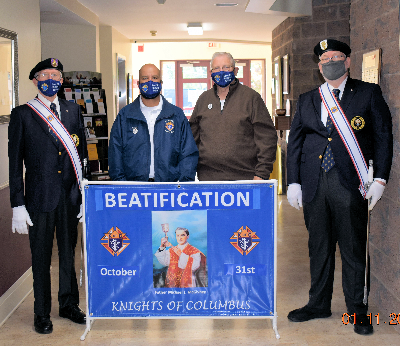 Knight Bob Smith, Chancellor Freddie Garcia, Grand Knight George Brown and Past Grand Knight Eddie Williams  during the Beatification event for Fr. McGivney